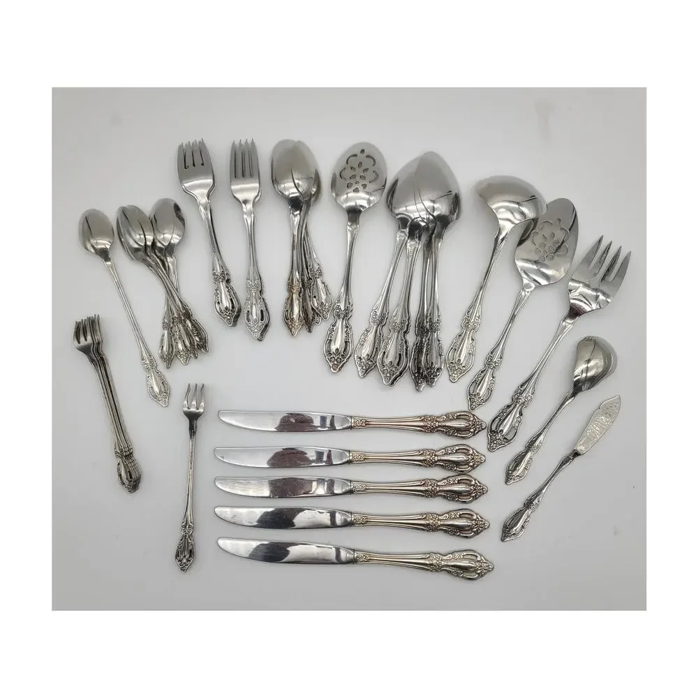 Vintage Oneida RAPHAEL 44 pc Flatware Marks - Oneida, Canada, USA, Distinction